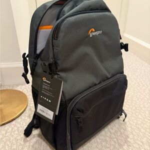 Black and Gray camera backpack lowepro